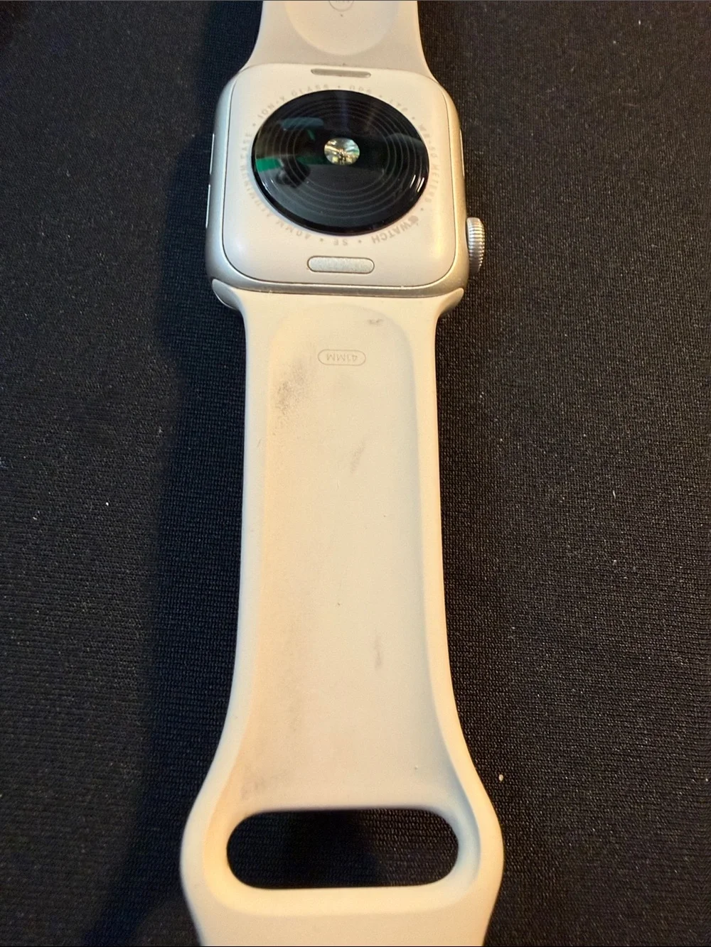 Smartwatch with Tan Silicone Band and Magnetic Charger